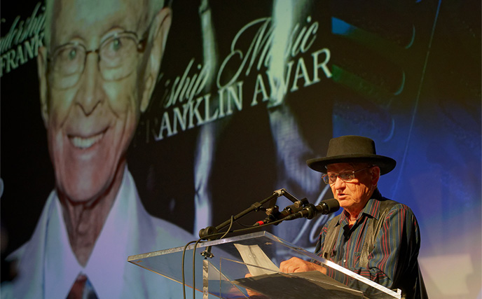 Charlie McCoy presented the Spirit Award to Jim Foglesong